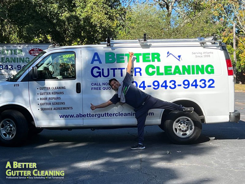Professional gutter cleaning removing debris from gutters